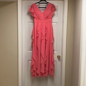 Pretty coral ruffle dress.